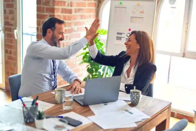 Do You Need a Solicitor When Starting a Business in the UK? 2 celebrating business success
