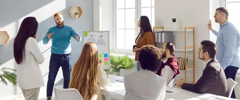 How to Motivate Your Employees When They’re Not Doing Well 1 motivating employees at team meeting